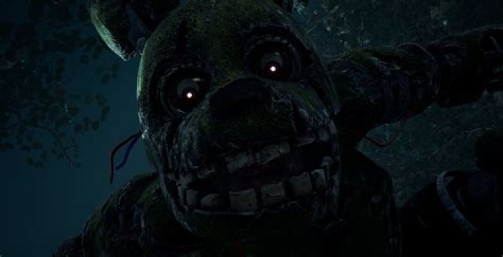 How do I keep Springtrap away from the office in FNAF 3?