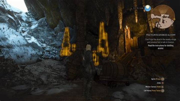 What does the hand icon indicate, when using Witcher Sense, especially when it appears over tiles in caves?