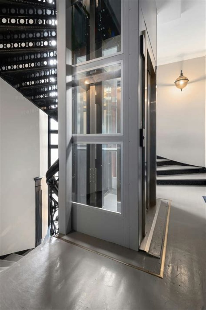 What is the best rest position for two elevators in a 10-story building?